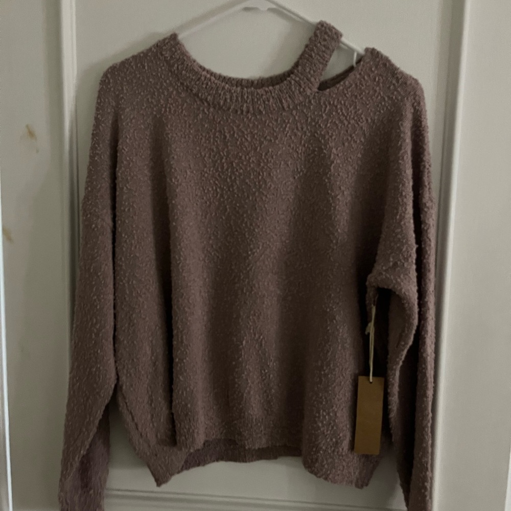 NWT pink sweater with cute rip